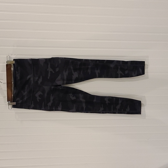 Practically brand new!  Athleta Ultimate 7/8 tights in black camo print. Size XS - Picture 5 of 9